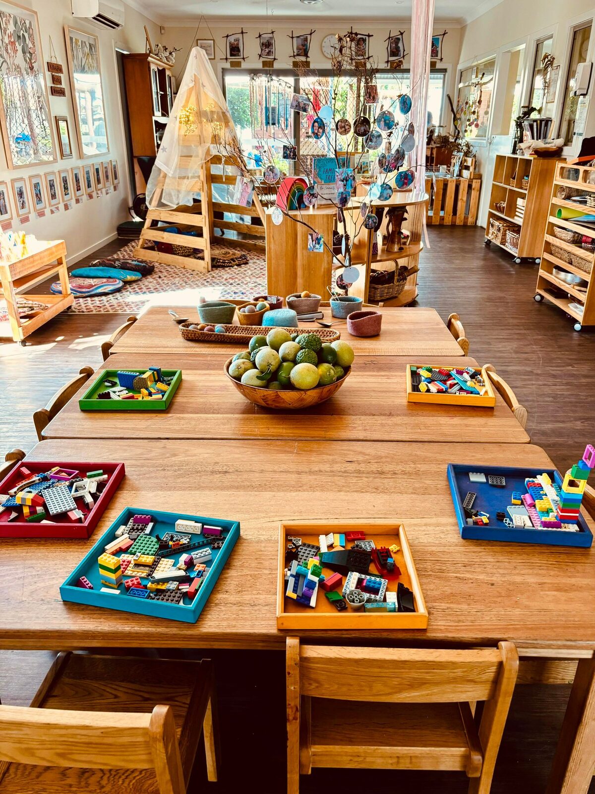 Bright Merrimac classroom with timber tables, natural light and indoor plants