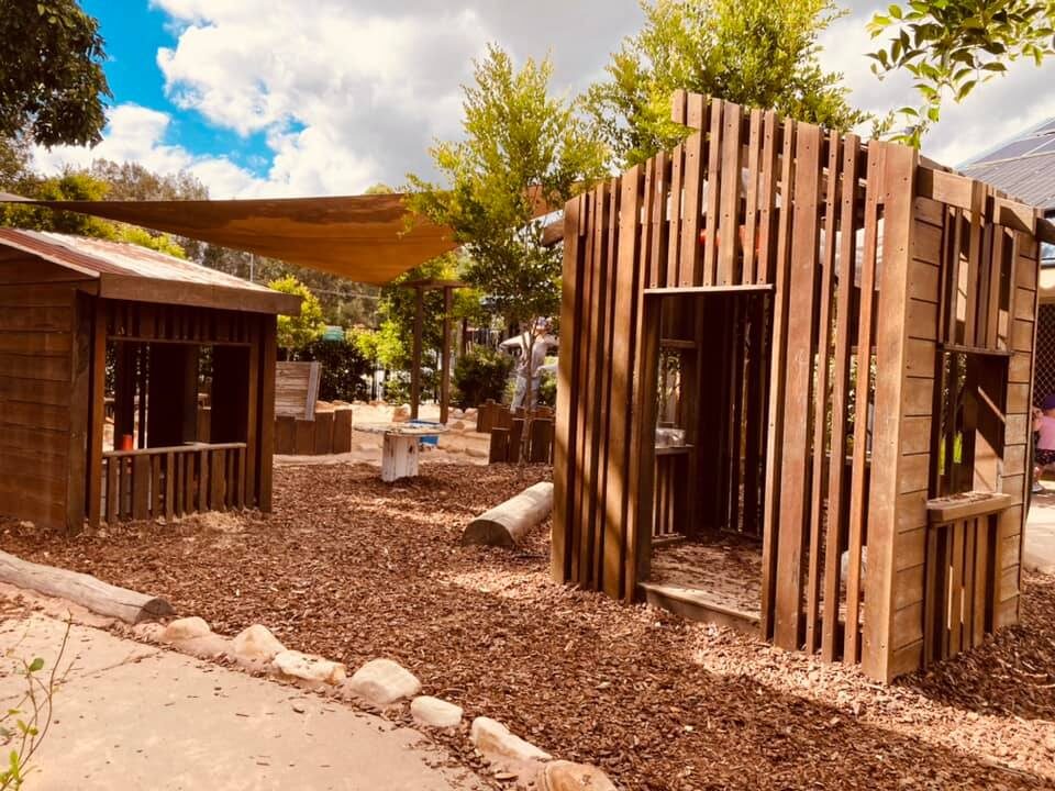 Children's cubby house made from reclaimed timber in the garden