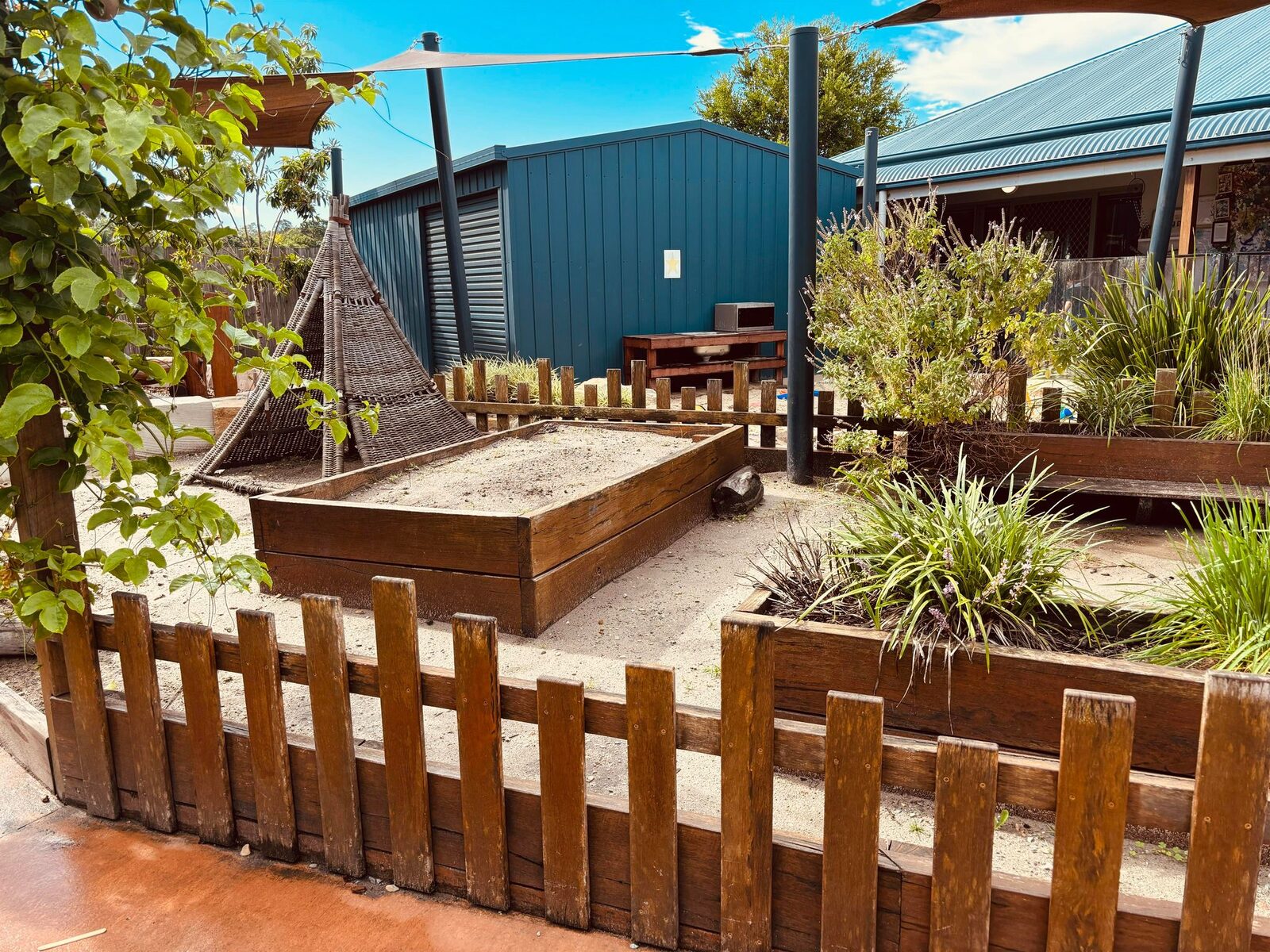 Native garden beds and outdoor learning space at Natural Elements Merrimac